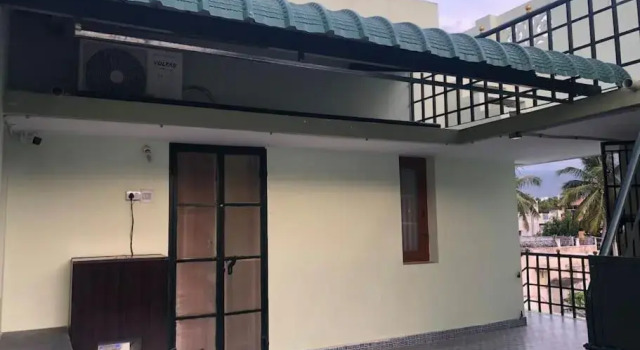 House With Hill Temple View