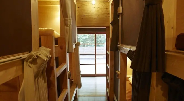 Кровать в общем номере Guest House Preta Torami