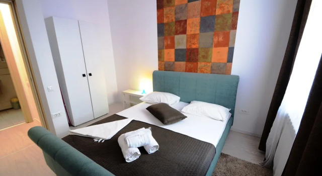 Апартаменты Цокольный этаж с балконом Uptown Residence Apartments