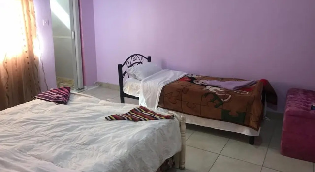 Кровать в общем номере Al-Amer Hostel 1