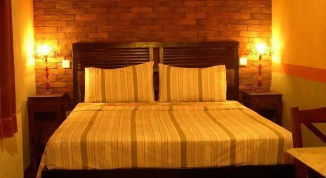 Трёхместный номер Standard с балконом Mythos Guesthouse