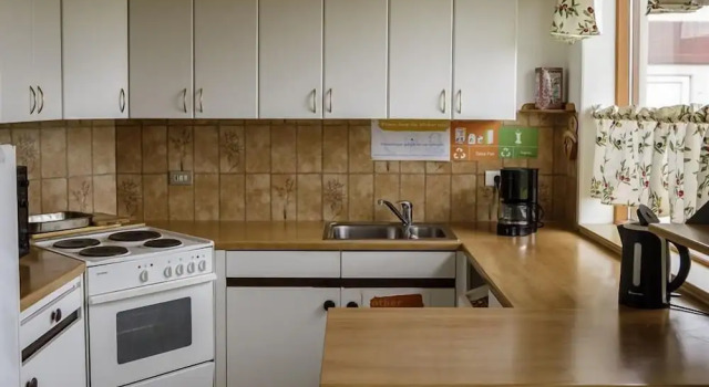 Кровать в общем номере Kópasker Guesthouse