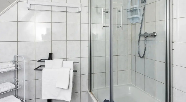 Апартаменты Grosse Ferienwohnung im Dachgeschoss in Bensersiel