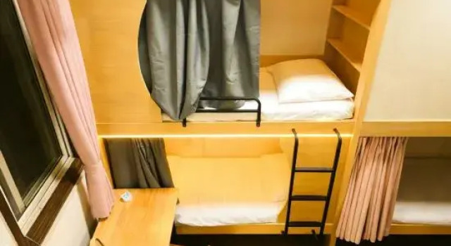 Кровать в общем номере Xi'an Three Shopkeepers Inn (Bell Tower Drum Tower Huimin Street Branch)