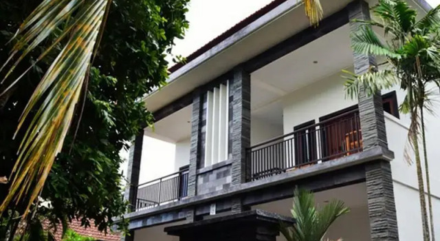 Кровать в общем номере Arca Bungalow