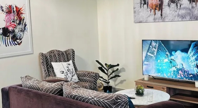 Clem Guest House, Забронировать Гостевой дом Бракенфелл Северный пригород Кейптауна