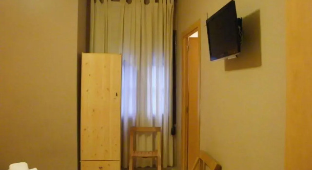 Номер Standard Pensión Corona