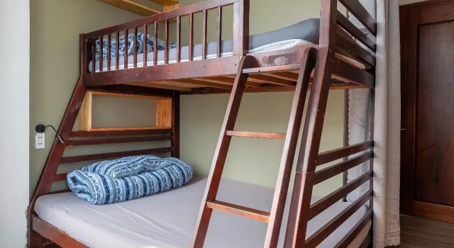 Кровать в общем номере Pi Boutique Hotel