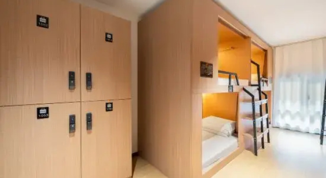 Кровать в общем номере Yizhou Tour Youth Travel Hotel,Xi'an Datang Night City Branch.