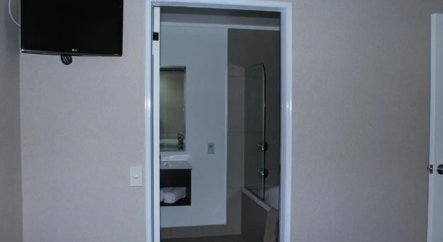 Апартаменты Executive Rose City Motel