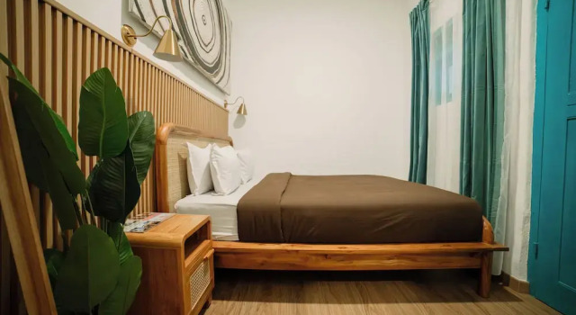 Économie chambre Snooze Malang