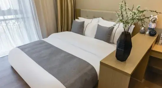Семейный люкс Wuhan Nanjing Garden S High-altitude Hotel (Hankou Railway Station Oceanwide CBD Branch)