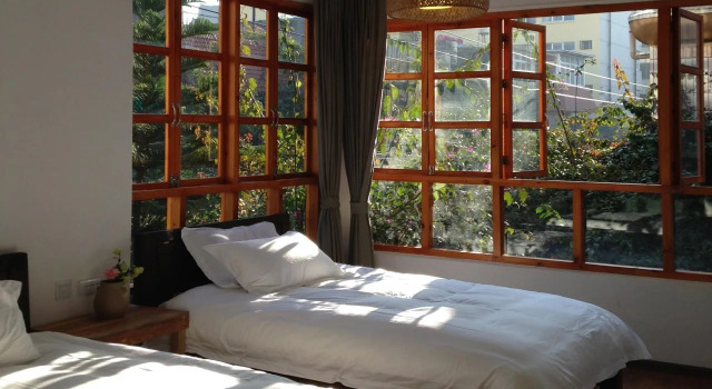 Mulan Guesthouse, Rezerwuj Hotel Xishan District Kunming, w pobliżu Daguan Pavilion