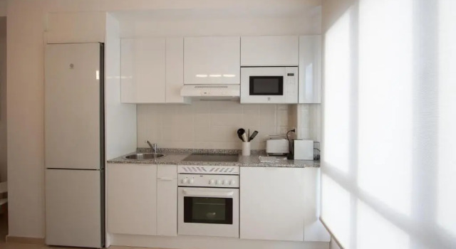 Апартаменты Cuquiellu. Apartamento con piscina