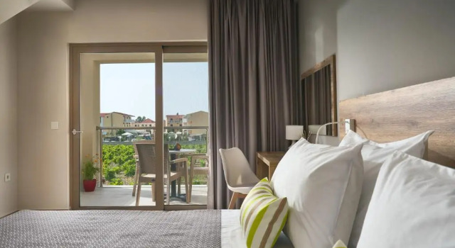 Апартаменты Grapevines Hotel