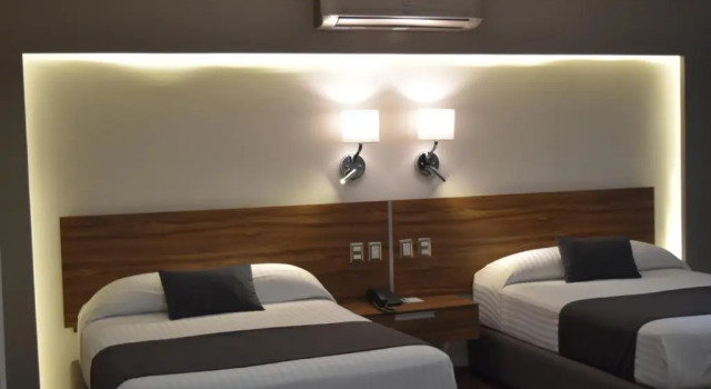 Двухместный номер Economy Estanza Hotel & Suites