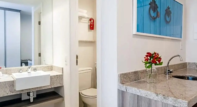 Четырёхместный номер Luxury Ramada Hotel & Suites Campos Dos Goytacazes