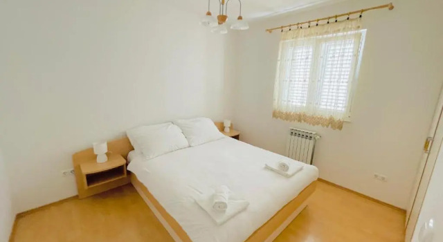 Апартаменты с 2 комнатами с балконом и с частичным видом на море Villa Maestral Zadar
