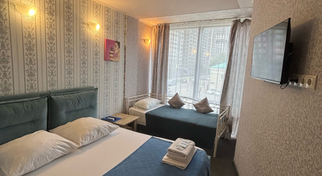 Standard- tredobbelt familie værelse Halva Mini-Hotel