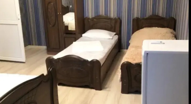 Четырёхместный номер Superior с балконом и с красивым видом из окна Гостевой дом Изумрудный