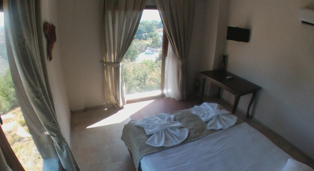 Двухместный номер Standard с балконом и с красивым видом из окна Gödence Hotel Restoran Bungalow
