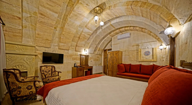 Номер с аркой с джакузи и камином Отель Balloon Cave