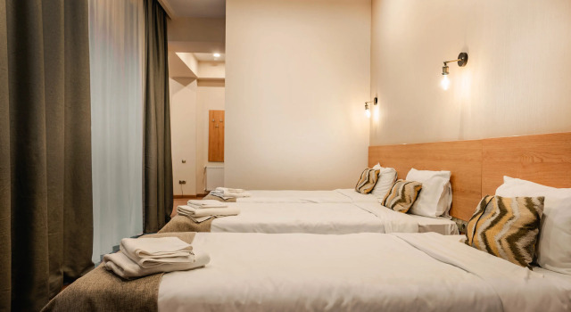 Трёхместный номер Standard с балконом Отель Bakuriani Inn