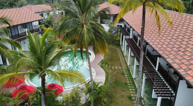 Курортный отель Palm Garden Ayurveda Resort