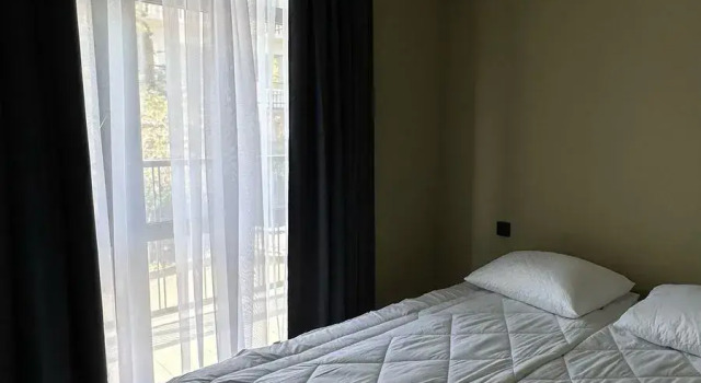 Люкс с 2 комнатами с балконом и с видом на город Отель Aurora Inn Gagra