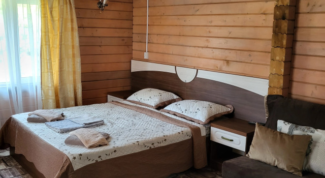 Четырёхместный коттедж с террасой Отель Гостеев