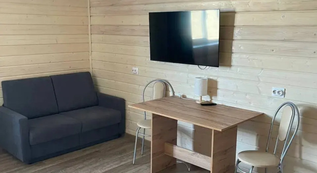 Четырёхместный номер Deluxe с красивым видом из окна Талвиоя
