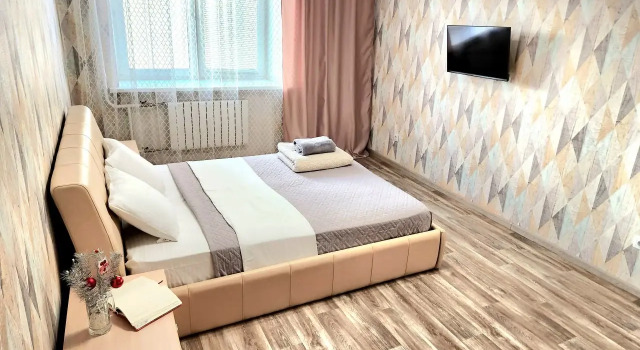 Uyutnaya kvartira u Matreshki Flat, Book Apartment Hotels in Tyumen Region with Parking, Parking