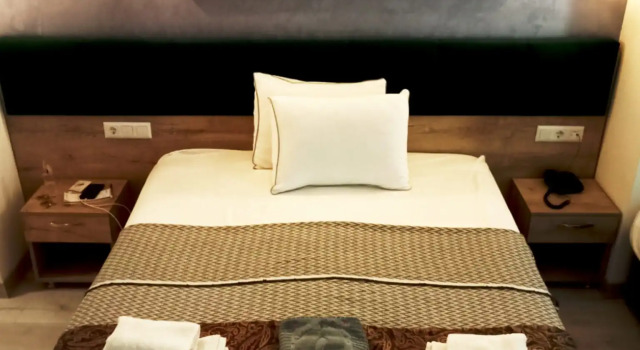 Четырёхместный номер Comfort с балконом и с красивым видом из окна Отель Loren Hotel & Suites