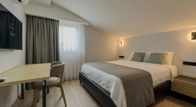 Номер Standard с балконом и с видом на город Отель Leaf River Suites