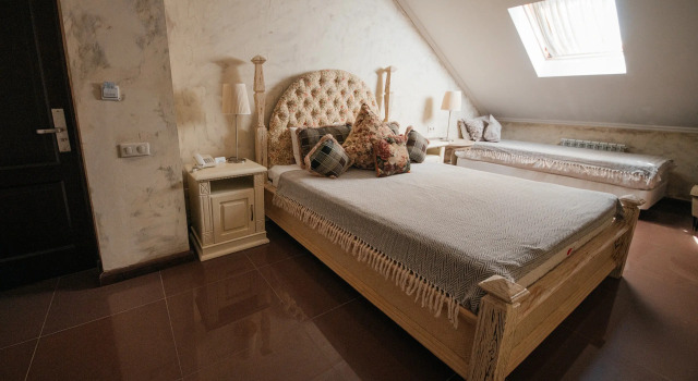 Четырёхместный номер Мансарда Отель Rassl Country Home