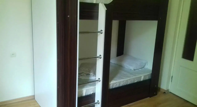 Postel ve společném pokoji Tempus Hostel