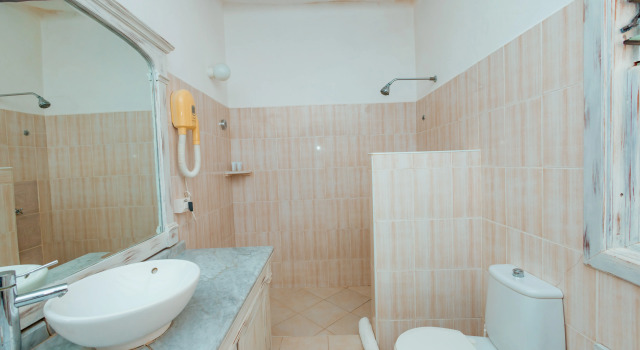 Трёхместный номер Deluxe с балконом и с красивым видом из окна Twiga Beach Resort