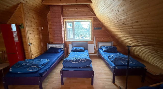 Кровать в общем номере Гостевой дом Юшково