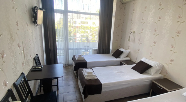 Трёхместный номер Standard с балконом и с красивым видом из окна Отель Joy Apartments