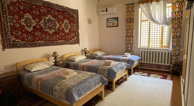 Трёхместный номер Standard с красивым видом из окна Guest House Khiva ,, BOYJON OTA "