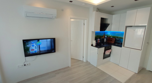 Apartament 1 sypialnia i balkonem i z widokiem na basen World Cities Residence Apart-Hotel