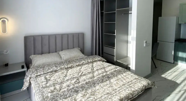 Апартаменты-студия 30 кв.м. с кроватью и балконом, с 13 по 15 этаж