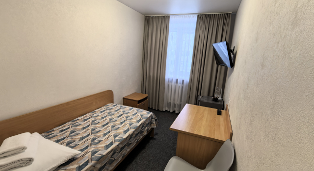 Single 1st Category room Timan Hotel