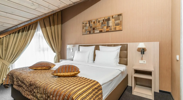 Семейный Luxe Мансарда с 2 комнатами с видом на лес Отель Arkhyz Royal Resort & Spa