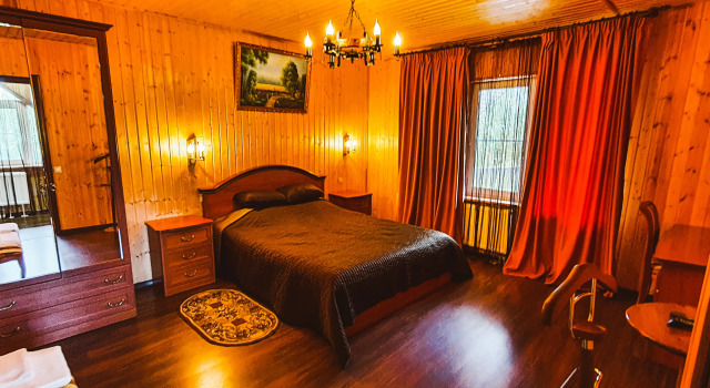 Коттедж с балконом и с красивым видом из окна База Отдыха Family House