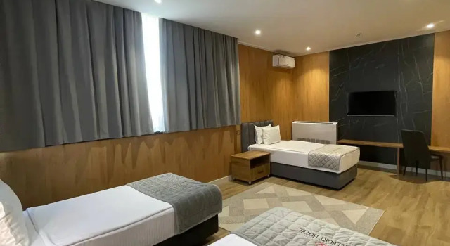 Standardowy trzyosobowy pokój Wellfort Hotel