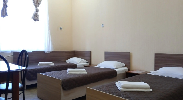 Кровать в общем номере Отель Smart Hotel Оренбург