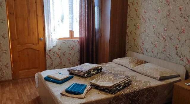 Трёхместный номер Deluxe с балконом и с видом на море Гостевой дом  У Андрея и Анны