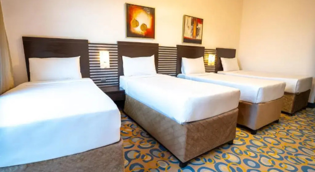 Четырёхместный номер Standard Al Hidayah Towers Hotel