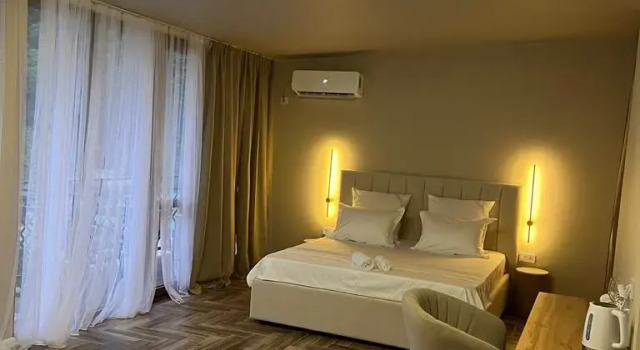 Четырёхместные апартаменты c 1 комнатой с балконом Отель Rit_hotel